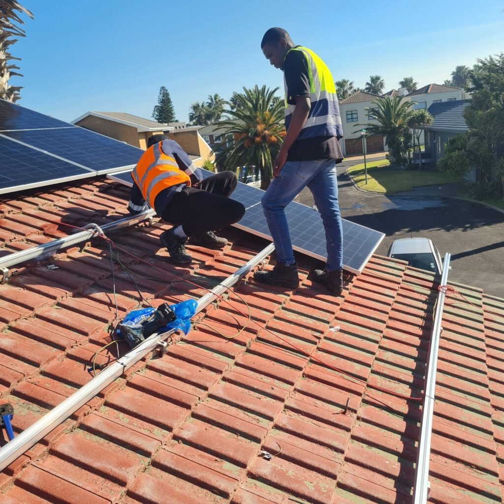 Gracelight Team Installing Solar on roof
